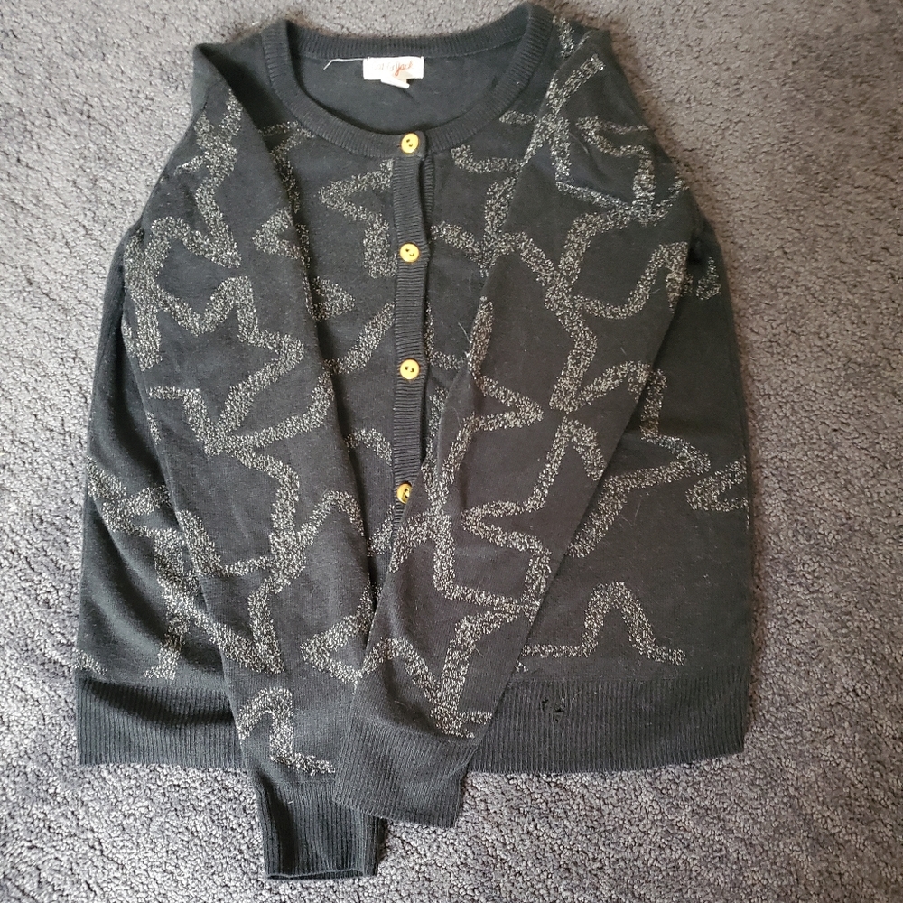 black cardigan with stars